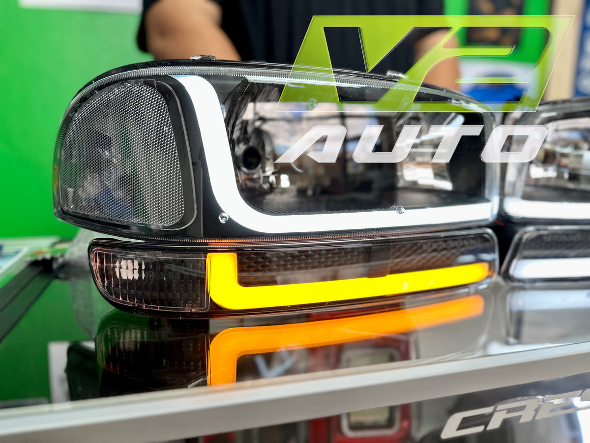 99-06 GMC Sierra Yukon "Double L Bar Switchback" Headlights